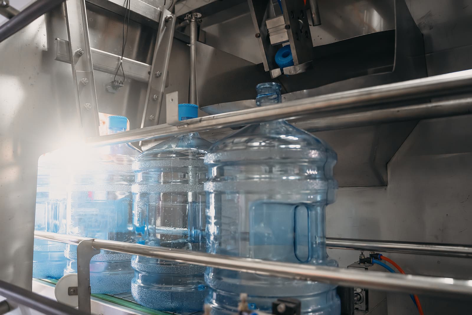 Switch water supplier - gallons on automated conveyor production line